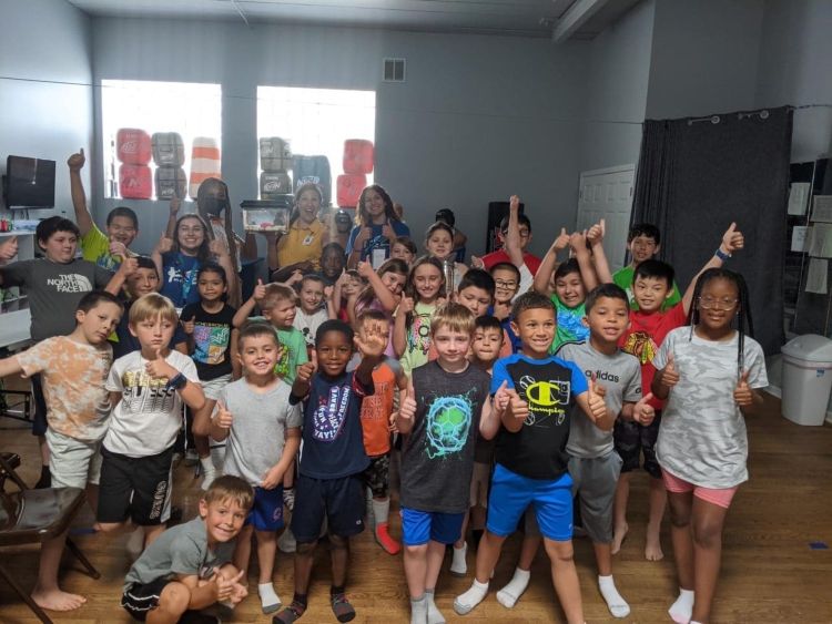 Image of group of kids enjoying the session of being educated about insects and bugs
