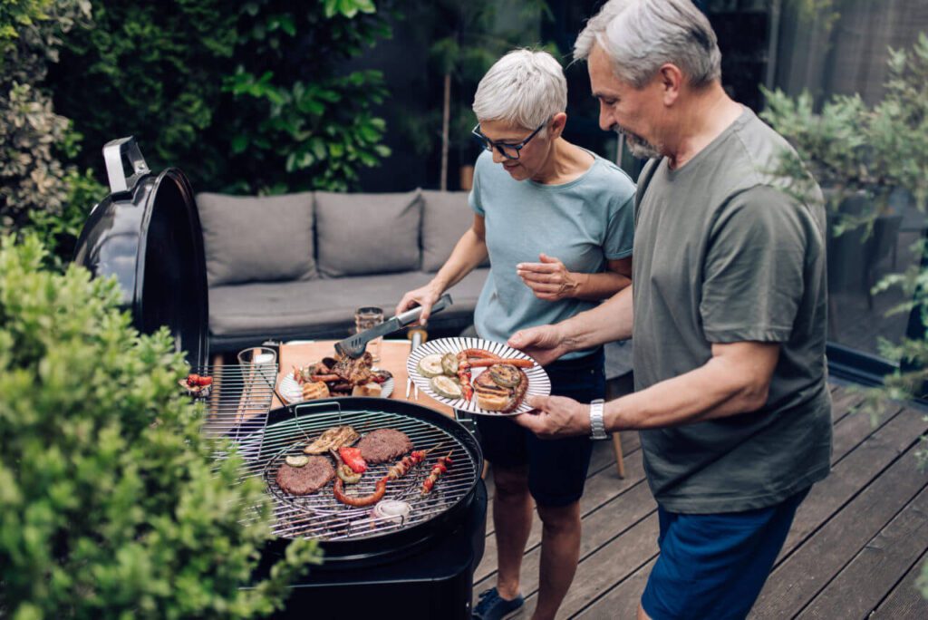 A Man and a Woman Are Cooking Food without Summer Bugs Fear in Northfield, IL