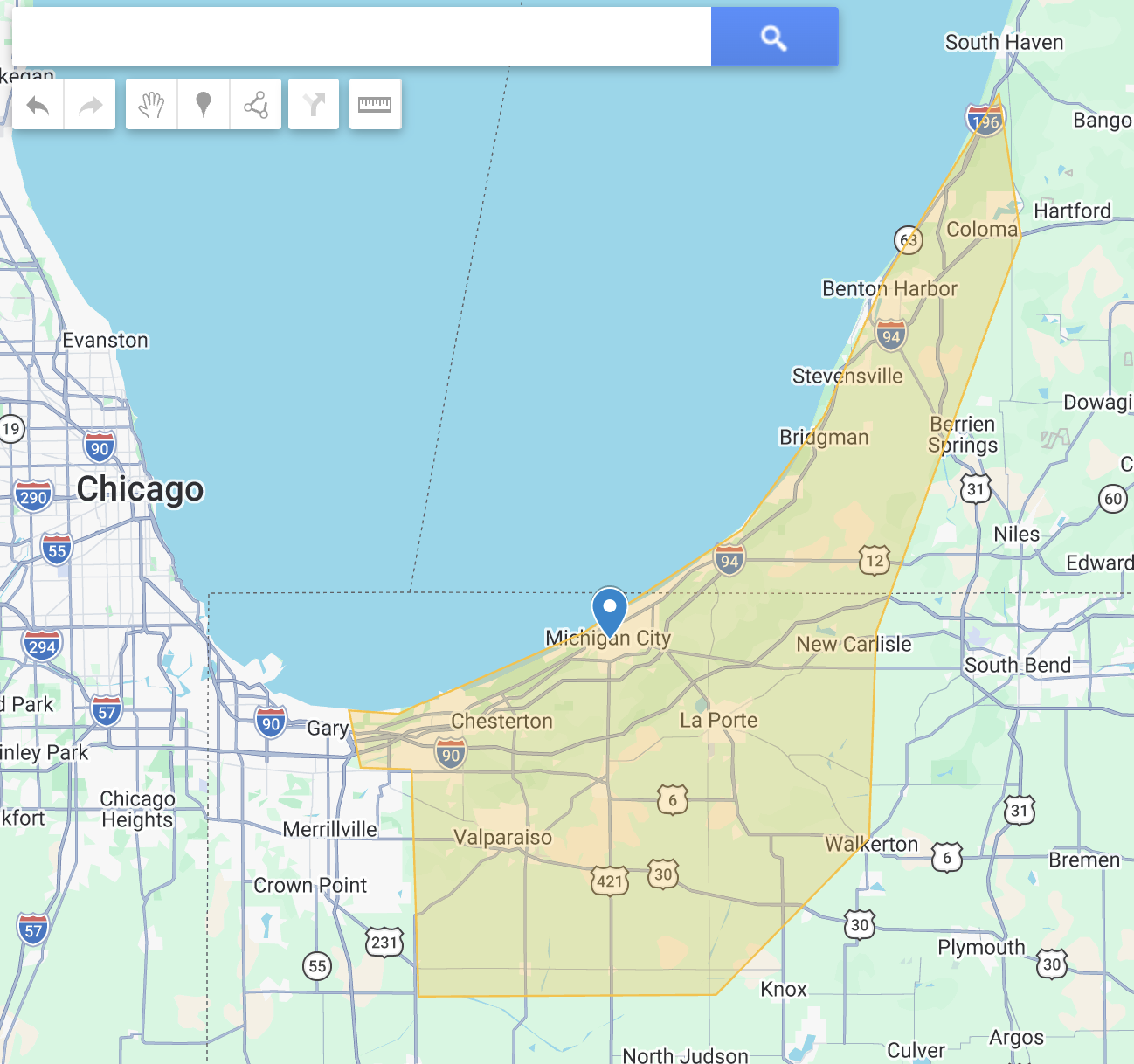 Map highlighting a triangular region along the southern shore of Lake Michigan, spanning parts of Illinois, Indiana, and Michigan, with Chicago and Michigan City labeled—ideal for locating Michigan City Pest Control Services.